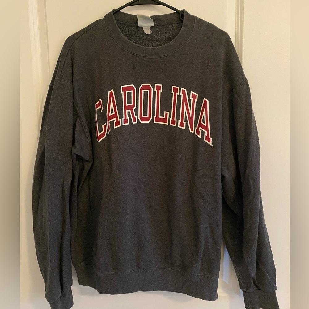 Large University of South Carolina crew neck sweatshirts.
